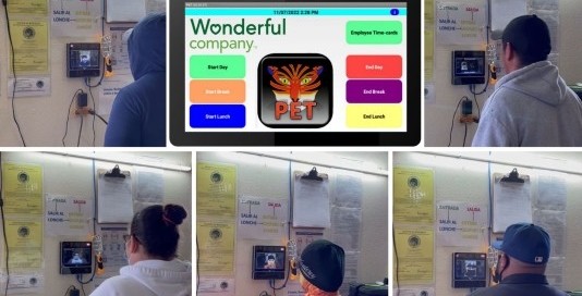 PetTiger employees using the IrisTime iT100 biometric reader